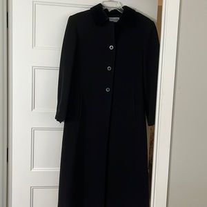 Almost new Forecaster winter midi coat with Black velvet collar.